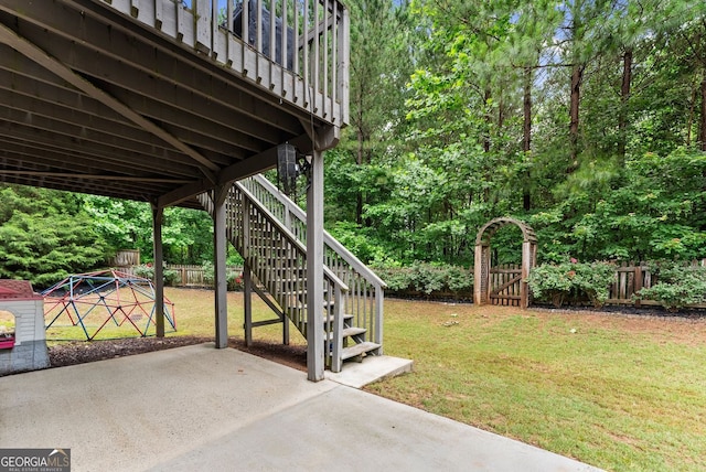 6160 Overleaf Ter, Cumming, GA 30040 - view of yard featuring a patio, stairway, and a gate