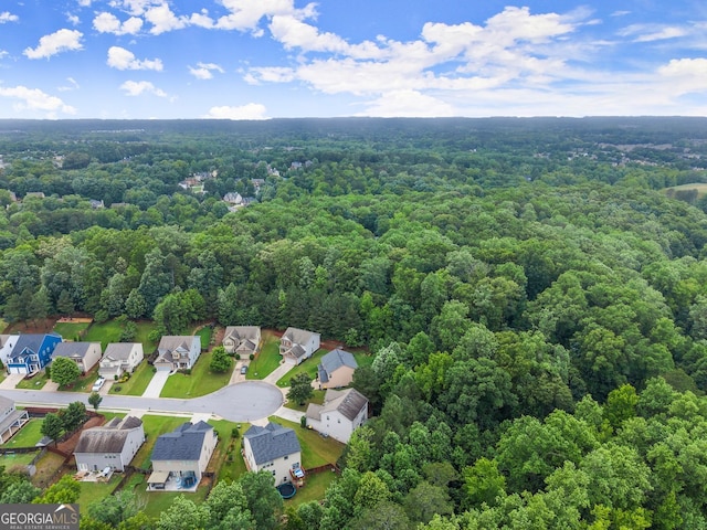 6160 Overleaf Ter, Cumming, GA 30040 - aerial overview of property's location featuring a heavily wooded area and nearby suburban area