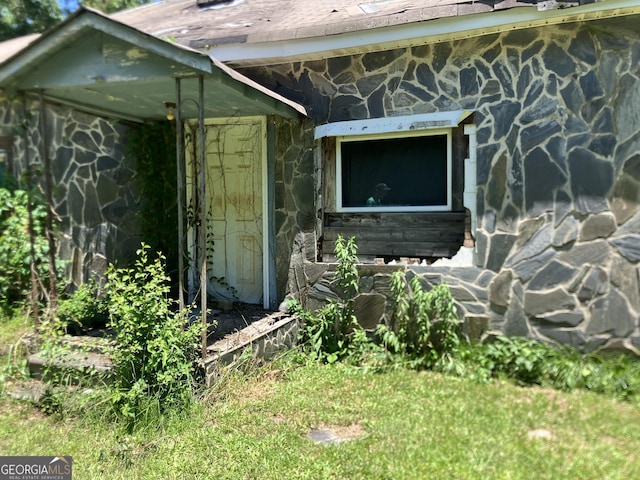 72 N Pomona Rd N, Hampton, GA 30228 - doorway to property with stone siding