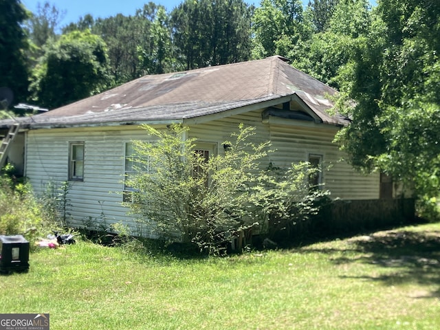 72 N Pomona Rd N, Hampton, GA 30228 - view of side of property with a yard