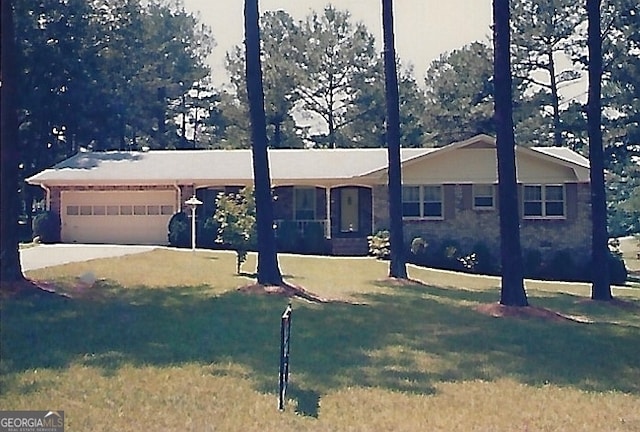 5125 Flakes Mill Rd, Ellenwood, GA 30294 - single story home featuring a garage and a front yard