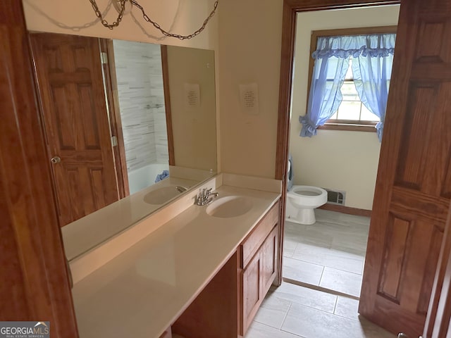 5125 Flakes Mill Rd, Ellenwood, GA 30294 - full bath featuring vanity and tile patterned flooring