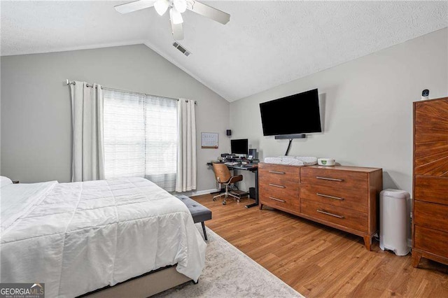 1047 Woodsong Pass Ct, Lawrenceville, GA 30043 - bedroom featuring light wood-style floors, lofted ceiling, ceiling fan, and an office area