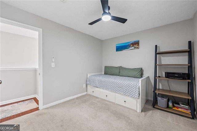 1047 Woodsong Pass Ct, Lawrenceville, GA 30043 - carpeted bedroom featuring baseboards and ceiling fan