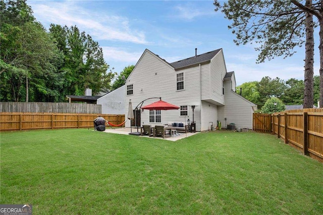 1047 Woodsong Pass Ct, Lawrenceville, GA 30043 - rear view of house with a patio and central air condition unit