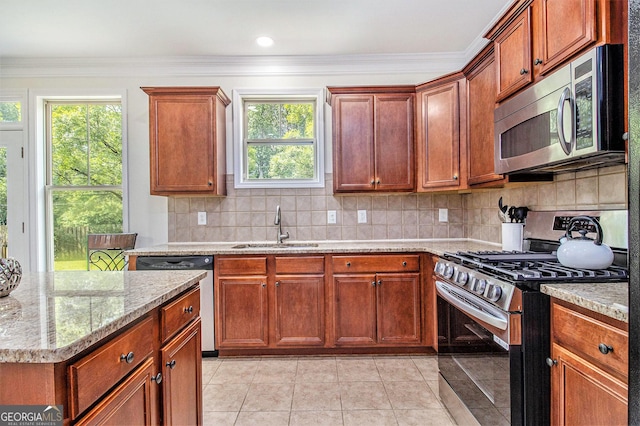 14 Mcgregor Ln, Dawsonville, GA 30534 - kitchen featuring appliances with stainless steel finishes, a sink, light stone counters, decorative backsplash, and light tile patterned floors