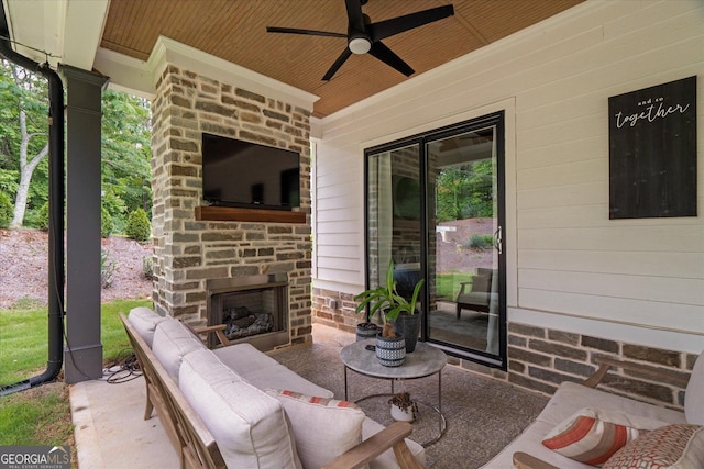 2490 S Carroll St, Villa Rica, GA 30180 - view of patio / terrace with an outdoor stone fireplace and ceiling fan