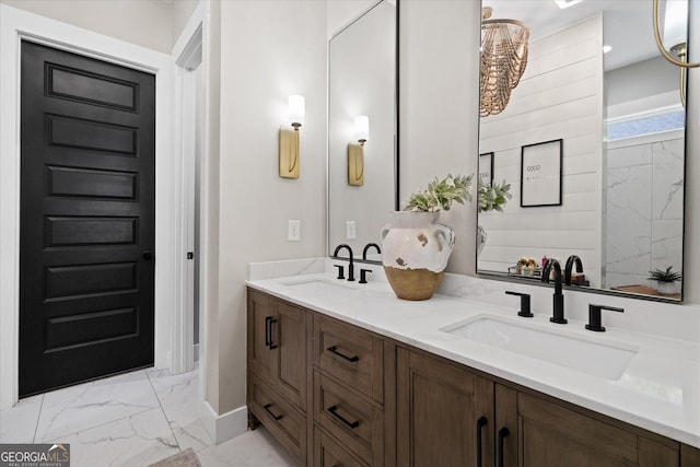 2490 S Carroll St, Villa Rica, GA 30180 - bathroom featuring marble look tiles and double vanity