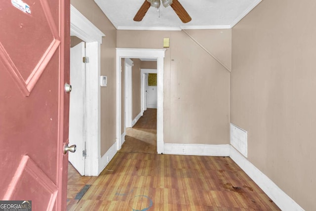 507 W 35th St, Savannah, GA 31415 - entrance foyer featuring wood finished floors, baseboards, ceiling fan, and crown molding