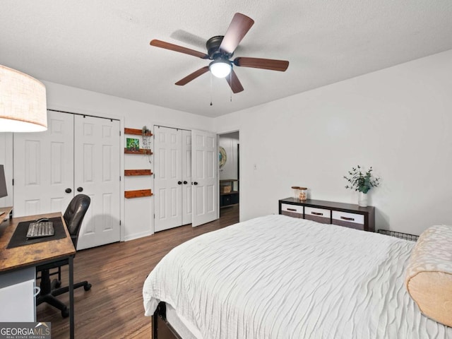 150 Archer Rd, Colbert, GA 30628 - bedroom featuring multiple closets, dark wood-type flooring, an office area, and ceiling fan
