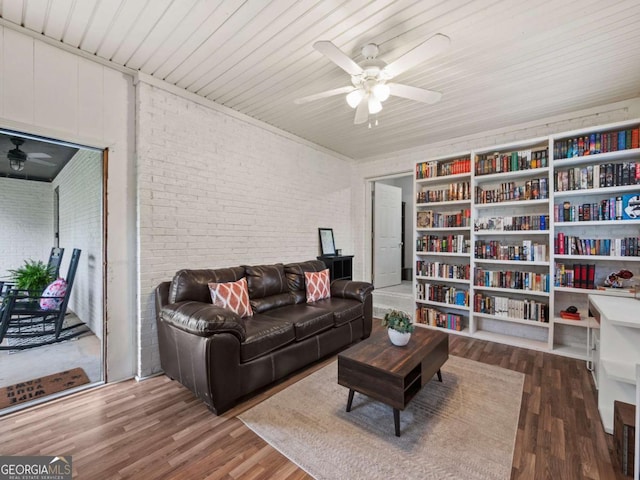 150 Archer Rd, Colbert, GA 30628 - living area with a ceiling fan, brick wall, wood finished floors, and wood ceiling