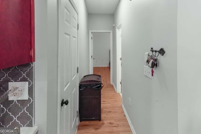 3898 Heritage Oaks Dr, Powder Springs, GA 30127 - corridor featuring light wood-style floors and baseboards