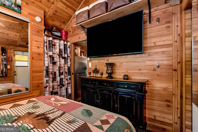76 Hidden Valley Rd, Cleveland, GA 30528 - bedroom with wood ceiling, lofted ceiling, wooden walls, and freestanding refrigerator