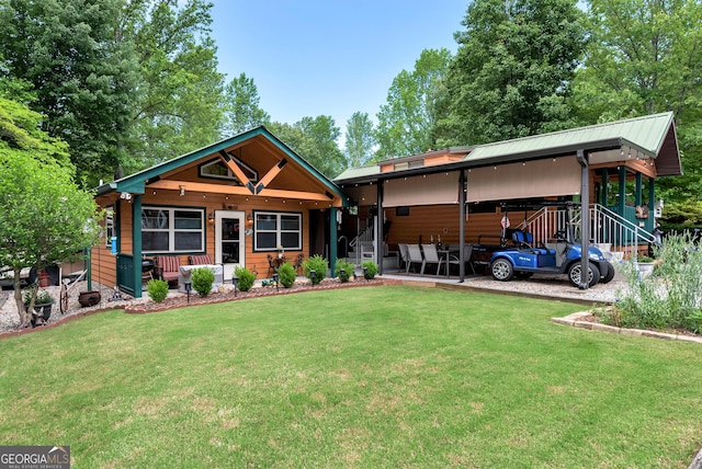 76 Hidden Valley Rd, Cleveland, GA 30528 - view of front facade with a front lawn, metal roof, and a porch