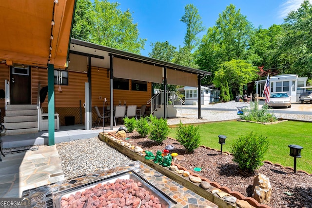 76 Hidden Valley Rd, Cleveland, GA 30528 - back of house with a lawn