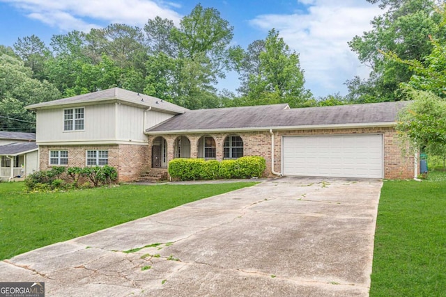 3947 Veracruz Ct, Decatur, GA 30034 - tri-level home featuring concrete driveway, brick siding, and a front lawn