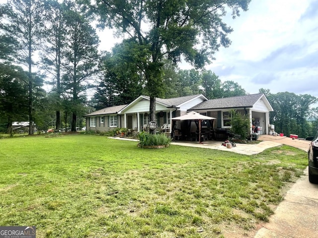 3750 Dial Mill Rd NE, Conyers, GA 30013 - back of house with a patio area, a yard, and a gazebo