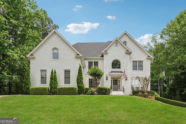 115 Hopewell Grove Dr, Milton, GA 30004 - view of front of home with a front yard and roof with shingles
