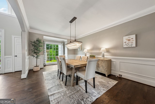 115 Hopewell Grove Dr, Milton, GA 30004 - dining room featuring ornamental molding, a wainscoted wall, dark wood-style floors, a decorative wall, and arched walkways