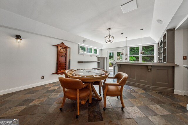 115 Hopewell Grove Dr, Milton, GA 30004 - dining room featuring french doors, stone tile flooring, and baseboards