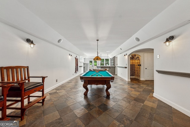 115 Hopewell Grove Dr, Milton, GA 30004 - game room featuring stone tile flooring, baseboards, and arched walkways