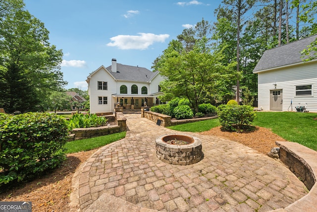 115 Hopewell Grove Dr, Milton, GA 30004 - view of patio / terrace featuring a fire pit