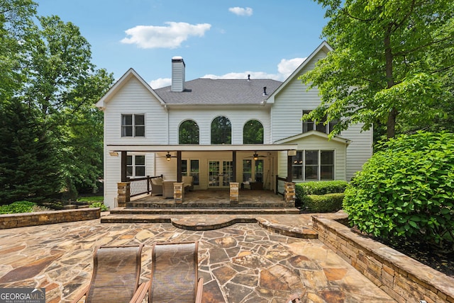 115 Hopewell Grove Dr, Milton, GA 30004 - back of property with french doors, ceiling fan, a patio, a chimney, and roof with shingles