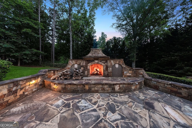 115 Hopewell Grove Dr, Milton, GA 30004 - view of patio / terrace with an outdoor stone fireplace