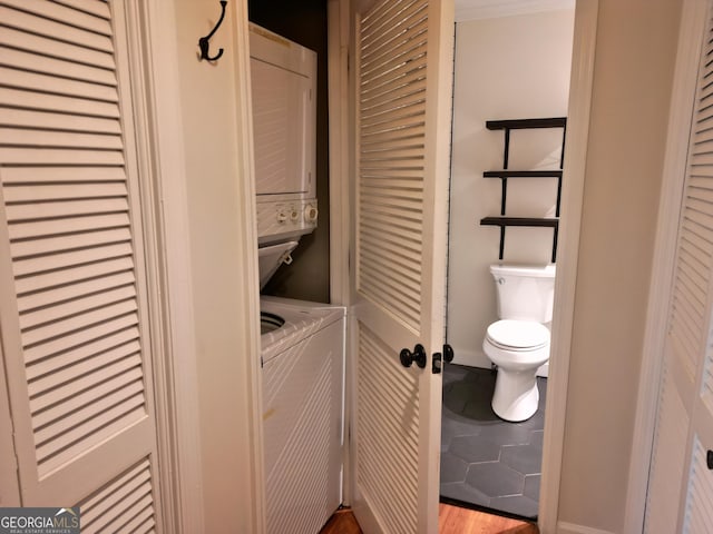 605 Candler St Unit A8, Gainesville, GA 30501 - washroom featuring stacked washer / drying machine and tile patterned flooring