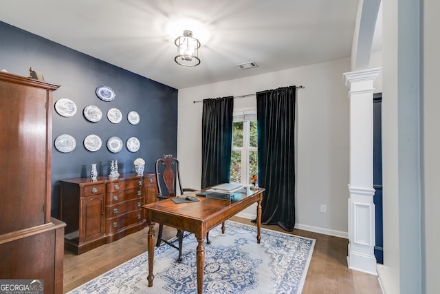 13 Westbrook Rd, Carrollton, GA 30116 - office area featuring wood finished floors, decorative columns, and baseboards