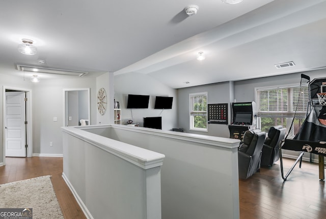13 Westbrook Rd, Carrollton, GA 30116 - kitchen featuring dark wood-type flooring, an island with sink, open floor plan, light countertops, and lofted ceiling