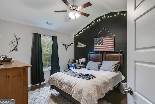 13 Westbrook Rd, Carrollton, GA 30116 - bedroom with lofted ceiling, wood finished floors, and a ceiling fan