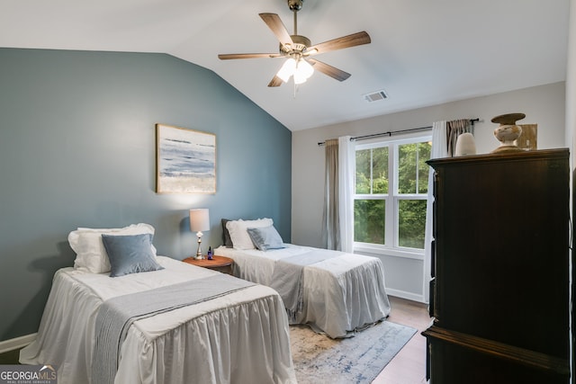 13 Westbrook Rd, Carrollton, GA 30116 - bedroom featuring vaulted ceiling, light wood-type flooring, and a ceiling fan