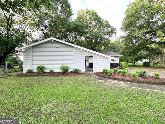 1918 Leigh Dr SW, Conyers, GA 30094 - view of front facade with brick siding