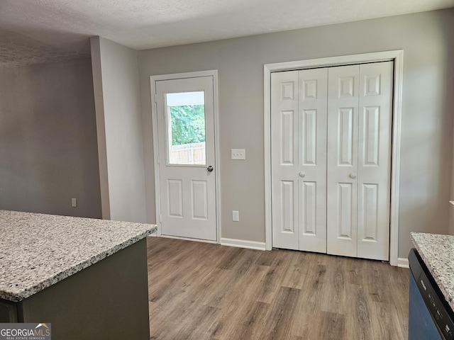 70 Shadow Ln, Carrollton, GA 30117 - kitchen featuring dishwasher, wood finished floors, and baseboards