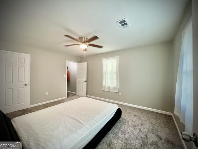 1962 Anderson Rd, Rentz, GA 31075 - bedroom featuring baseboards, a ceiling fan, and carpet floors