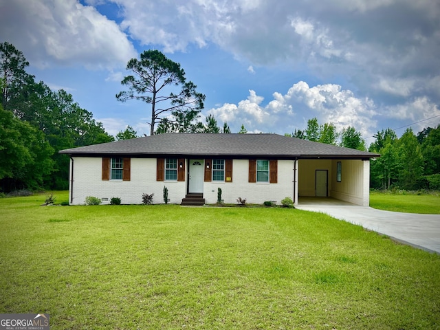 1962 Anderson Rd, Rentz, GA 31075 - single story home featuring driveway, a carport, a front yard, and brick siding