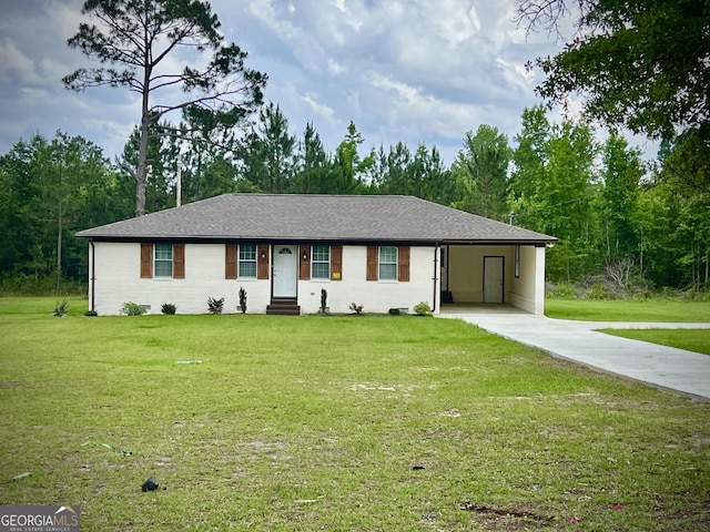 1962 Anderson Rd, Rentz, GA 31075 - single story home with driveway, a front yard, an attached carport, and entry steps