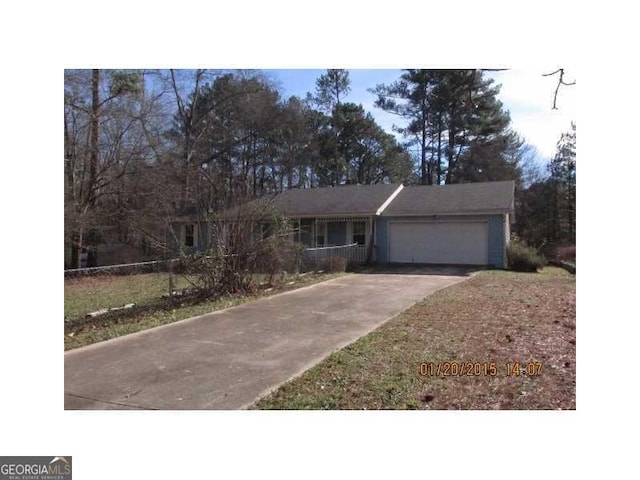 790 Mount Zion Rd NW, Conyers, GA 30012 - ranch-style home with an attached garage and driveway
