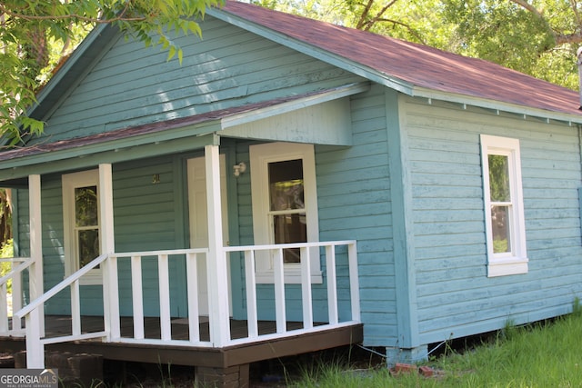311 W 11th St, Tifton, GA 31794 - view of home's exterior featuring metal roof