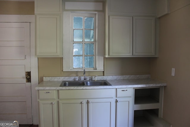 311 W 11th St, Tifton, GA 31794 - kitchen with a sink and light countertops