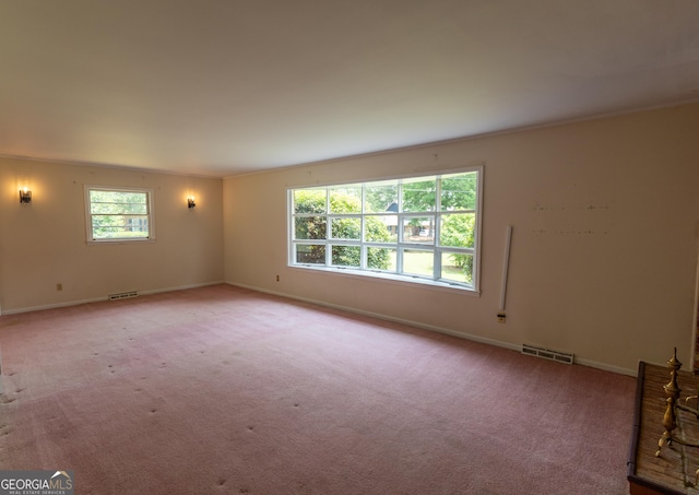 6214 Crestview Dr SE, Covington, GA 30014 - carpeted empty room with baseboards