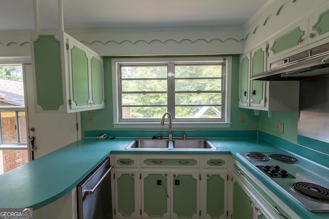 6214 Crestview Dr SE, Covington, GA 30014 - kitchen with stainless steel appliances, a sink, plenty of natural light, and light countertops