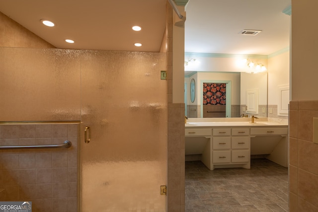6214 Crestview Dr SE, Covington, GA 30014 - full bath with tile walls, a shower stall, vanity, recessed lighting, and ornamental molding