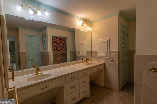 6214 Crestview Dr SE, Covington, GA 30014 - full bath with tile walls, double vanity, ornamental molding, wainscoting, and a closet