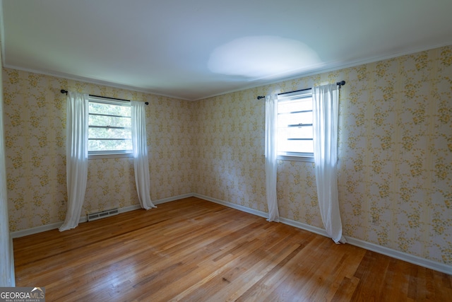 6214 Crestview Dr SE, Covington, GA 30014 - empty room featuring light wood finished floors and baseboards