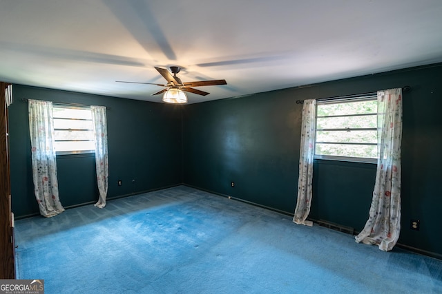 6214 Crestview Dr SE, Covington, GA 30014 - carpeted empty room with a ceiling fan and baseboards