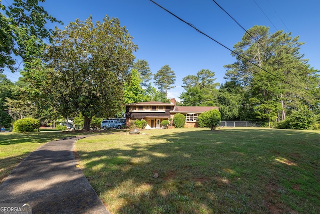6214 Crestview Dr SE, Covington, GA 30014 - view of front of house with a chimney