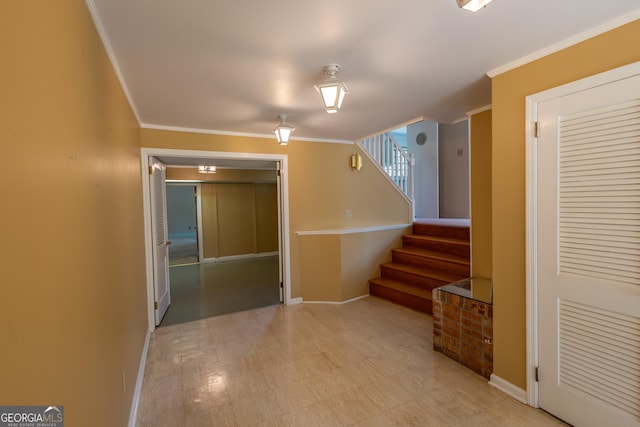 6214 Crestview Dr SE, Covington, GA 30014 - hall with crown molding, stairway, and baseboards