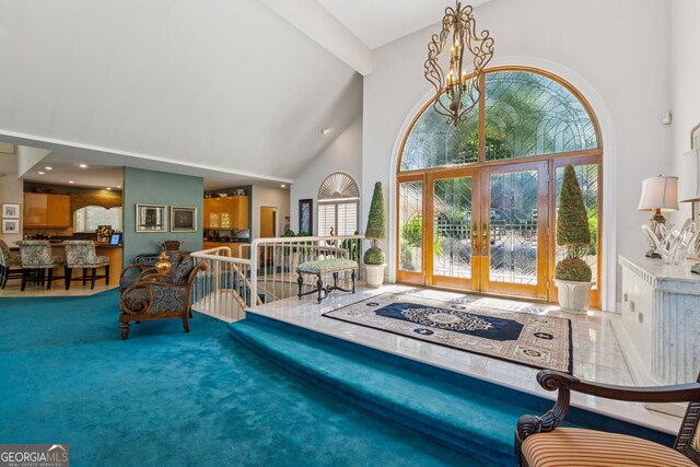 2917 Pointe Dr, Gainesville, GA 30506 - foyer with high vaulted ceiling, french doors, a chandelier, beam ceiling, and carpet floors